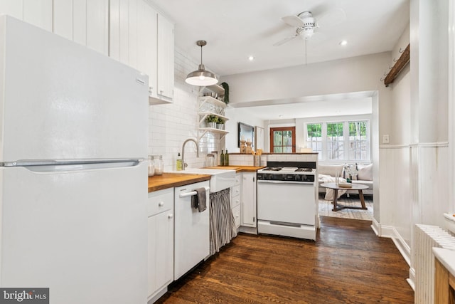 1918 E Albert St, Philadelphia, PA 19125 - kitchen featuring white appliances, butcher block counters, backsplash, white cabinets, and dark wood-type flooring