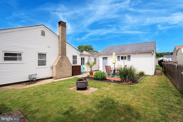 15 Paul Rd, Maple Shade, NJ 08052 - rear view of property featuring an outdoor fire pit, a fenced backyard, a patio, and a chimney