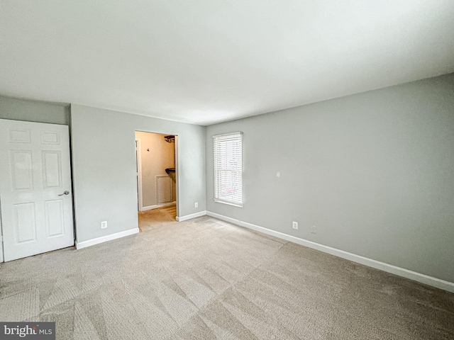 3801 Ridge Knoll Ct Unit 206A, Fairfax, VA 22033 - unfurnished bedroom with baseboards and carpet floors