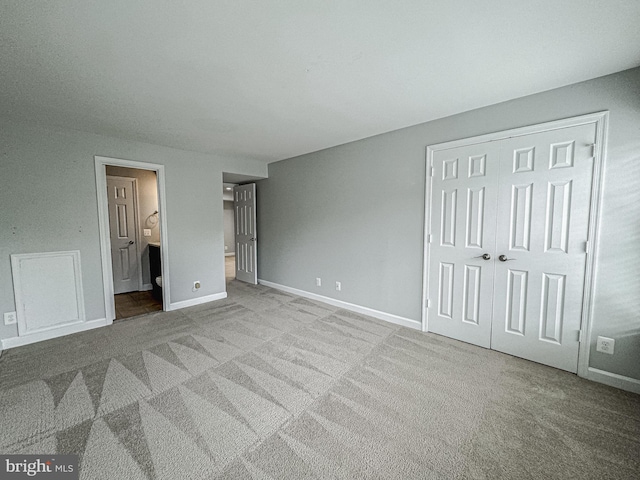 3801 Ridge Knoll Ct Unit 206A, Fairfax, VA 22033 - unfurnished bedroom featuring carpet floors, a closet, and ensuite bath