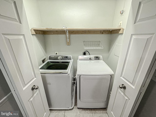 3801 Ridge Knoll Ct Unit 206A, Fairfax, VA 22033 - laundry room with washer and clothes dryer