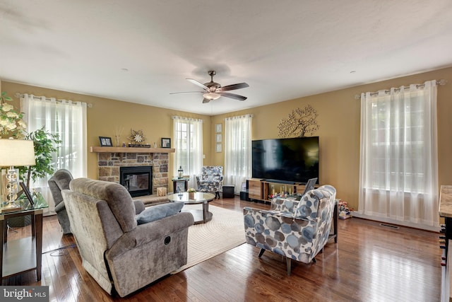 4136 Shanelle Ct Lot 10, Hampstead, MD 21074 - living area featuring hardwood / wood-style flooring, a stone fireplace, and a ceiling fan