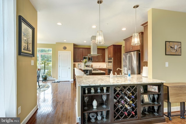 4136 Shanelle Ct Lot 10, Hampstead, MD 21074 - kitchen featuring appliances with stainless steel finishes, open shelves, island exhaust hood, light stone countertops, and a peninsula