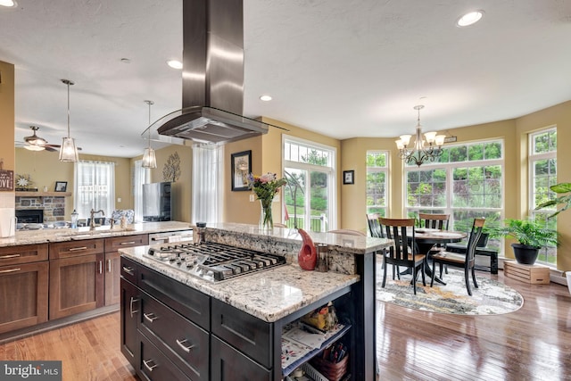 4136 Shanelle Ct Lot 10, Hampstead, MD 21074 - kitchen featuring stainless steel gas cooktop, healthy amount of natural light, island exhaust hood, a chandelier, and recessed lighting
