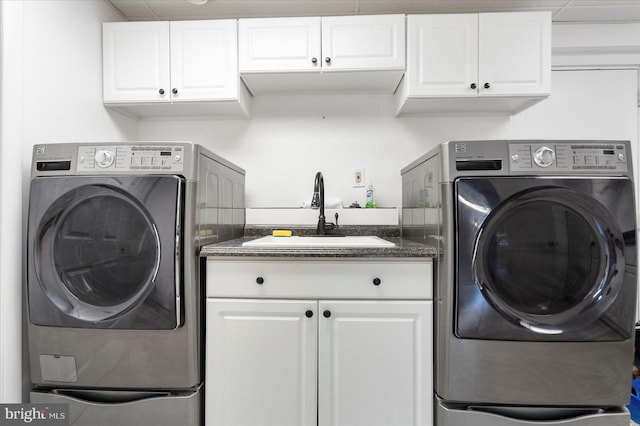 1215 Lorene Dr, Pasadena, MD 21122 - laundry room with cabinet space and washer and clothes dryer