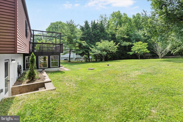1215 Lorene Dr, Pasadena, MD 21122 - view of yard featuring a wooden deck