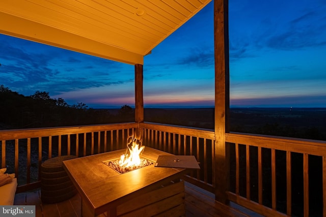 240 Howellsville Rd, Front Royal, VA 22630 - deck at dusk featuring an outdoor fire pit