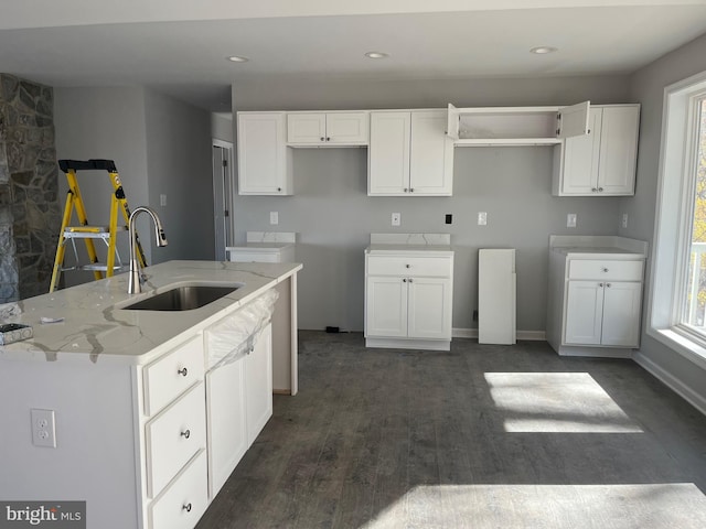 240 Howellsville Rd, Front Royal, VA 22630 - kitchen with plenty of natural light, white cabinetry, light stone counters, a kitchen island with sink, and recessed lighting