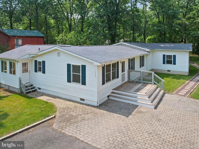 1440 Cedarhurst Rd, Shady Side, MD 20764 - view of front of house featuring crawl space, roof with shingles, and a front lawn