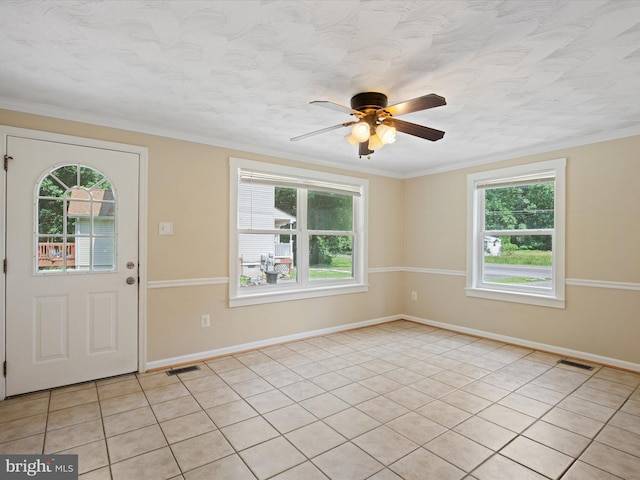 1440 Cedarhurst Rd, Shady Side, MD 20764 - entryway with plenty of natural light, light tile patterned floors, a ceiling fan, and ornamental molding