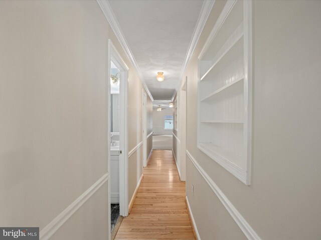 1440 Cedarhurst Rd, Shady Side, MD 20764 - hall with crown molding and light wood-style flooring