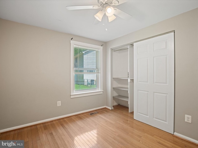 1440 Cedarhurst Rd, Shady Side, MD 20764 - unfurnished bedroom featuring light wood-type flooring, a closet, and a ceiling fan