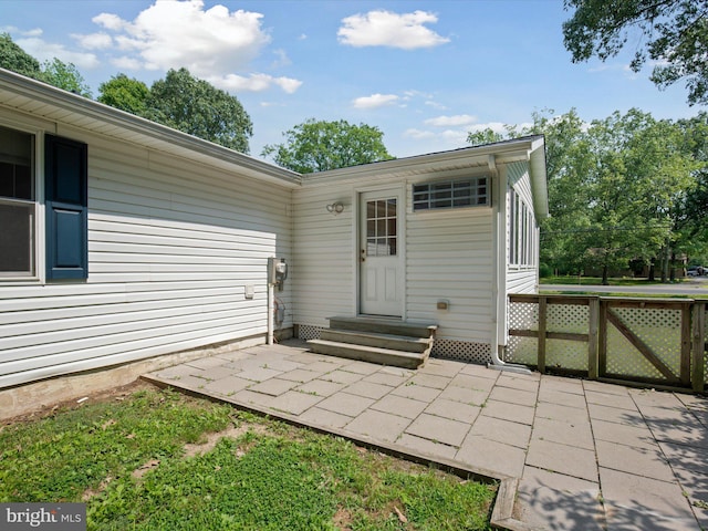 1440 Cedarhurst Rd, Shady Side, MD 20764 - doorway to property featuring a patio area and a gate
