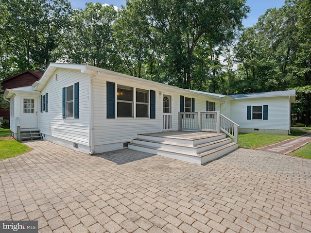 1440 Cedarhurst Rd, Shady Side, MD 20764 - view of front of home with crawl space and a patio area