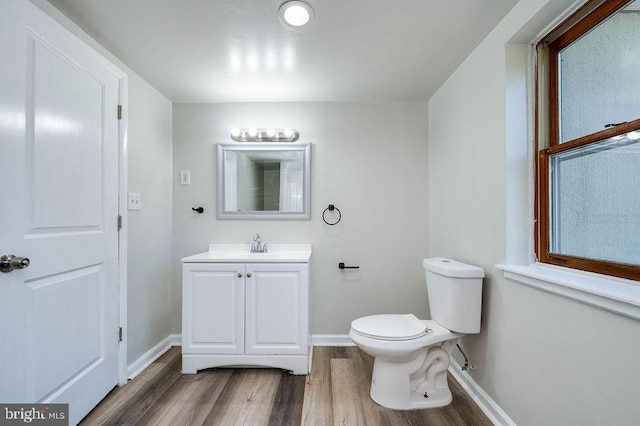 27 E Spring St, Frackville, PA 17931 - half bathroom featuring wood finished floors and vanity