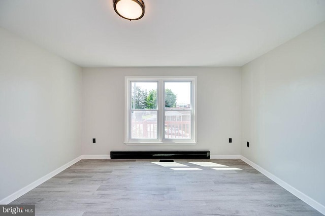 27 E Spring St, Frackville, PA 17931 - empty room featuring wood finished floors and baseboards