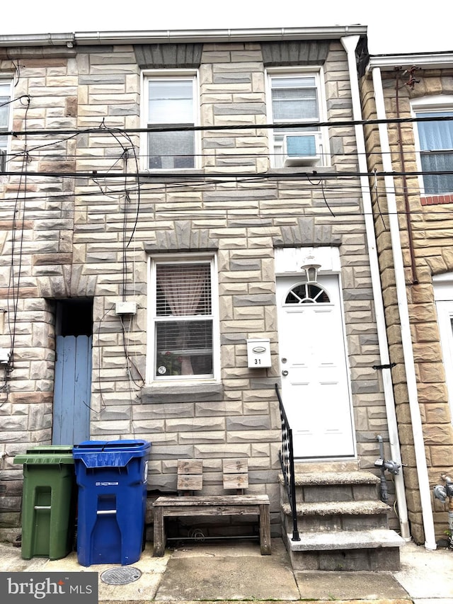 317 S Duncan St, Baltimore, MD 21231 - doorway to property with stone siding