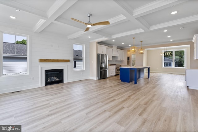 7108 River Drive Rd, Sparrows Point, MD 21219 - unfurnished living room with coffered ceiling, a ceiling fan, a fireplace, beam ceiling, and recessed lighting