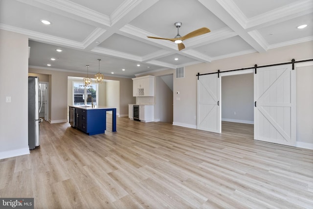 7108 River Drive Rd, Sparrows Point, MD 21219 - kitchen with appliances with stainless steel finishes, a barn door, coffered ceiling, a ceiling fan, and wine cooler
