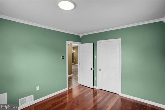 3629 Chestnut St, Reading, PA 19605 - unfurnished bedroom featuring crown molding and wood finished floors