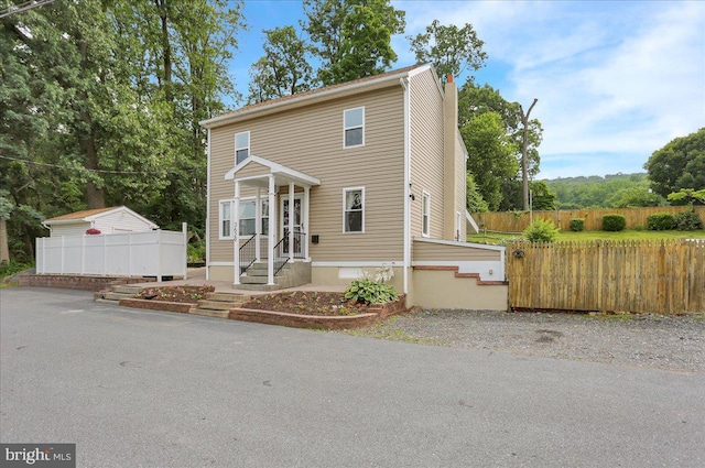 3629 Chestnut St, Reading, PA 19605 - view of front facade with a chimney