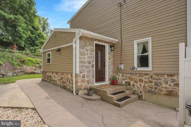 3629 Chestnut St, Reading, PA 19605 - entrance to property with stone siding and a patio