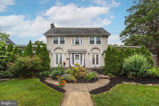 824 Lindale Ave, Drexel Hill, PA 19026 - view of front of house featuring french doors, a chimney, and a front lawn