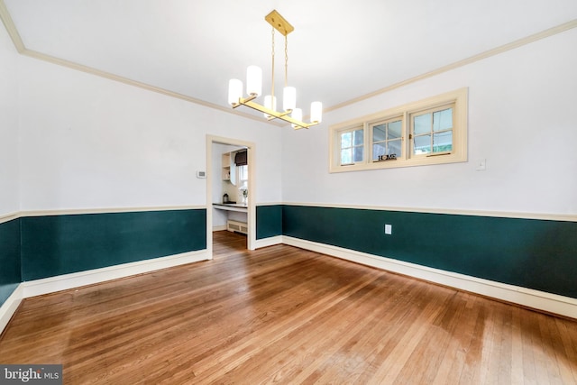 824 Lindale Ave, Drexel Hill, PA 19026 - unfurnished room with a chandelier, wood-type flooring, and crown molding