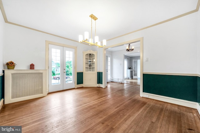 824 Lindale Ave, Drexel Hill, PA 19026 - unfurnished room with a chandelier, french doors, crown molding, and wood-type flooring