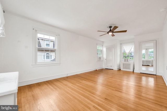 824 Lindale Ave, Drexel Hill, PA 19026 - unfurnished room with a ceiling fan, plenty of natural light, and light wood-style flooring