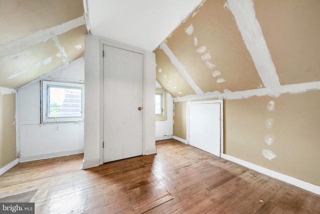 824 Lindale Ave, Drexel Hill, PA 19026 - bonus room featuring wood-type flooring, plenty of natural light, and lofted ceiling