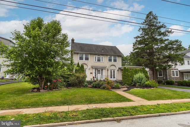 824 Lindale Ave, Drexel Hill, PA 19026 - colonial-style house with a front lawn and a chimney