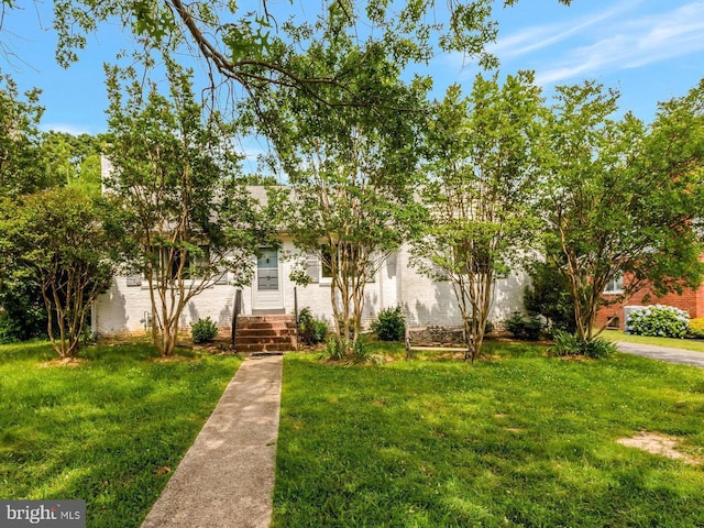 6005 Frederick St, Springfield, VA 22150 - view of property hidden behind natural elements with a front lawn and brick siding