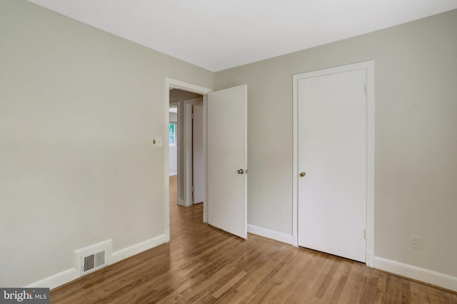6005 Frederick St, Springfield, VA 22150 - unfurnished bedroom with wood finished floors and baseboards