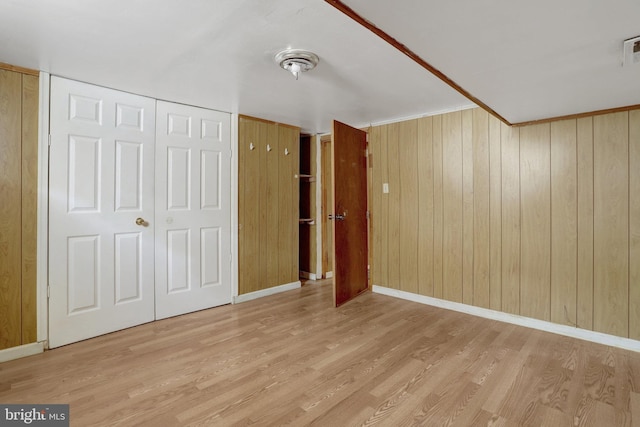 6005 Frederick St, Springfield, VA 22150 - unfurnished bedroom with wood finished floors and wood walls