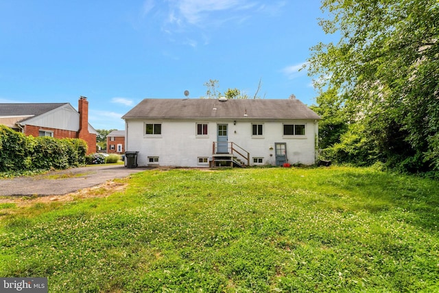 6005 Frederick St, Springfield, VA 22150 - rear view of property with a yard