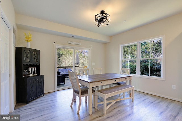 8207 Elm Ln, Chesapeake Beach, MD 20732 - dining space with light wood-style floors and baseboards