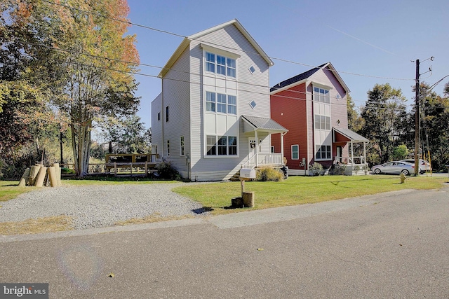 8207 Elm Ln, Chesapeake Beach, MD 20732 - view of front of house with a front lawn