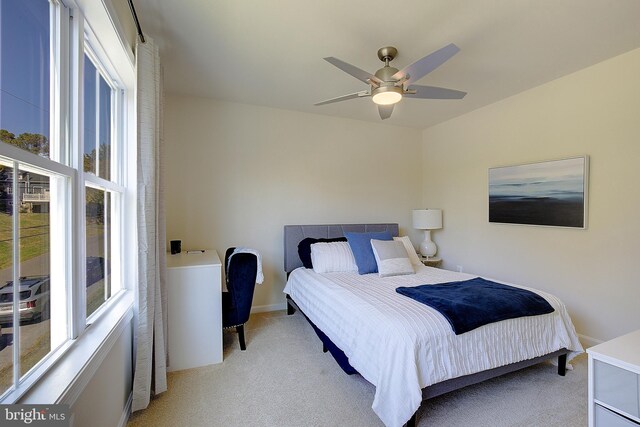 8207 Elm Ln, Chesapeake Beach, MD 20732 - bedroom featuring light colored carpet and ceiling fan