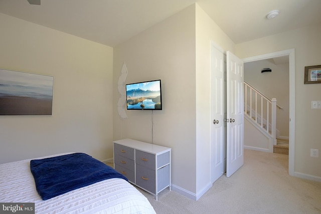 8207 Elm Ln, Chesapeake Beach, MD 20732 - bedroom featuring light carpet and baseboards