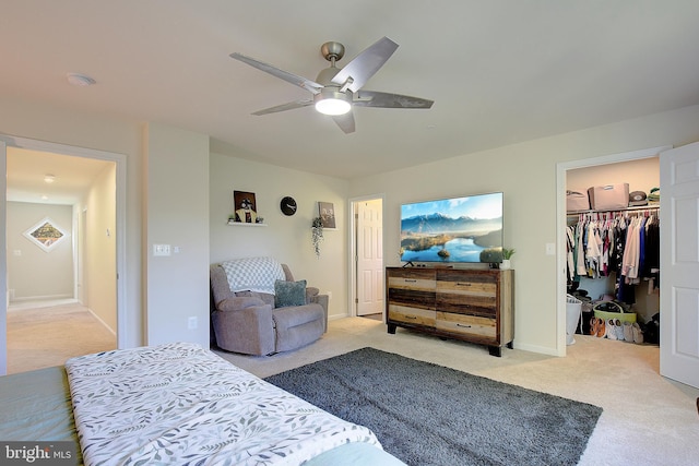8207 Elm Ln, Chesapeake Beach, MD 20732 - bedroom with carpet floors, a walk in closet, and a ceiling fan