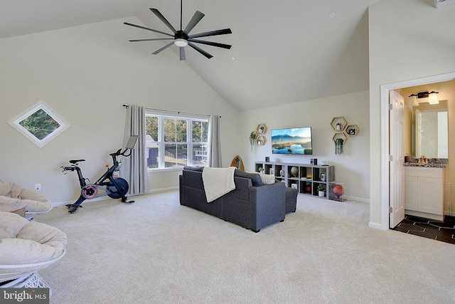 8207 Elm Ln, Chesapeake Beach, MD 20732 - living area featuring high vaulted ceiling, dark colored carpet, and ceiling fan