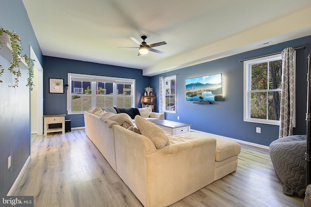 8207 Elm Ln, Chesapeake Beach, MD 20732 - living room featuring ceiling fan, light wood finished floors, and plenty of natural light