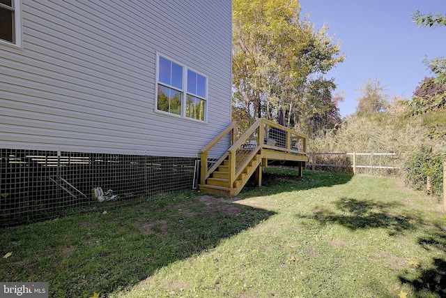 8207 Elm Ln, Chesapeake Beach, MD 20732 - view of yard with a wooden deck and stairs