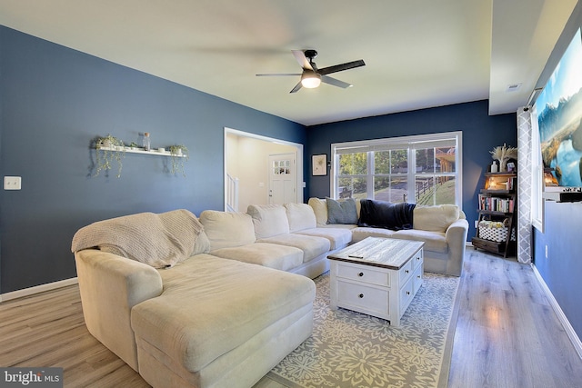 8207 Elm Ln, Chesapeake Beach, MD 20732 - living area featuring a ceiling fan and light wood-style floors