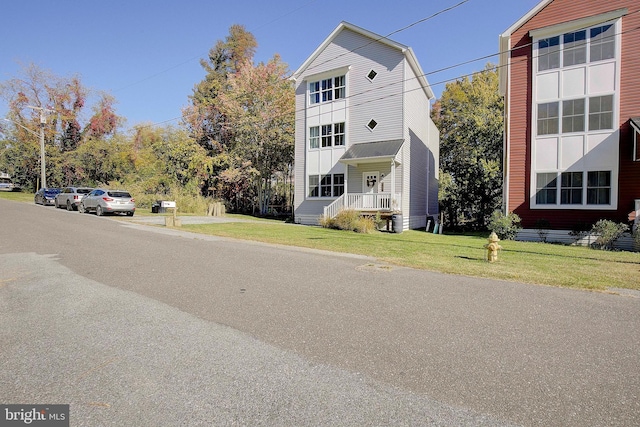 8207 Elm Ln, Chesapeake Beach, MD 20732 - view of front of property with a front lawn