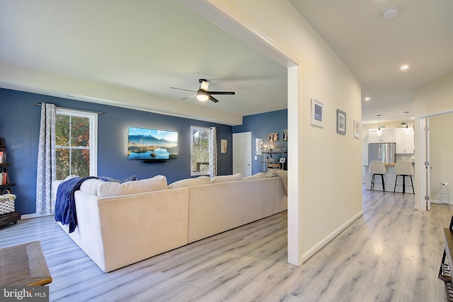 8207 Elm Ln, Chesapeake Beach, MD 20732 - living room featuring ceiling fan, light wood finished floors, healthy amount of natural light, and recessed lighting