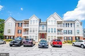 617 Himes Ave Unit Vi107, Frederick, MD 21703 - view of building exterior featuring uncovered parking