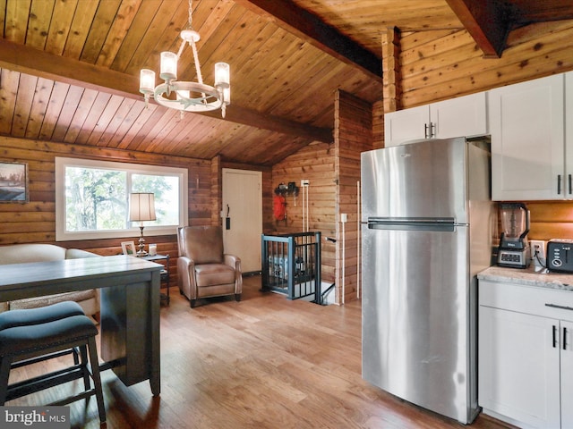 37AND41 Headwaters Rd, Chester Gap, VA 22623 - kitchen with freestanding refrigerator, a chandelier, wooden ceiling, white cabinetry, and light wood-style floors