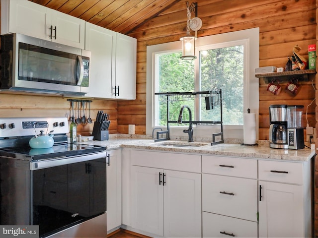 37AND41 Headwaters Rd, Chester Gap, VA 22623 - kitchen with stainless steel appliances, white cabinetry, vaulted ceiling, light stone counters, and wood ceiling